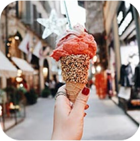 Strawberry ice cream in a hand